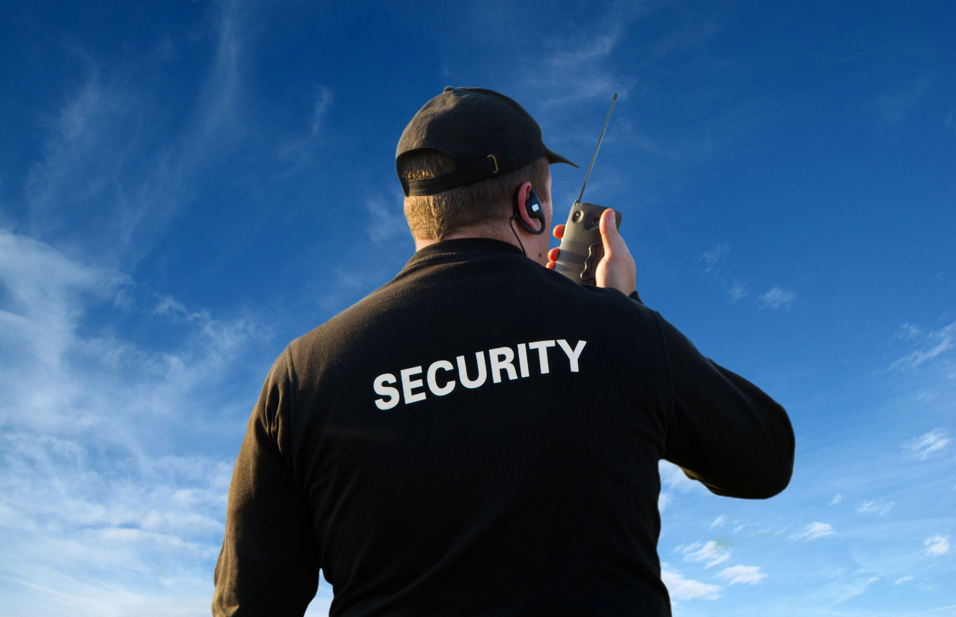 Professional security guard service viewed from behind