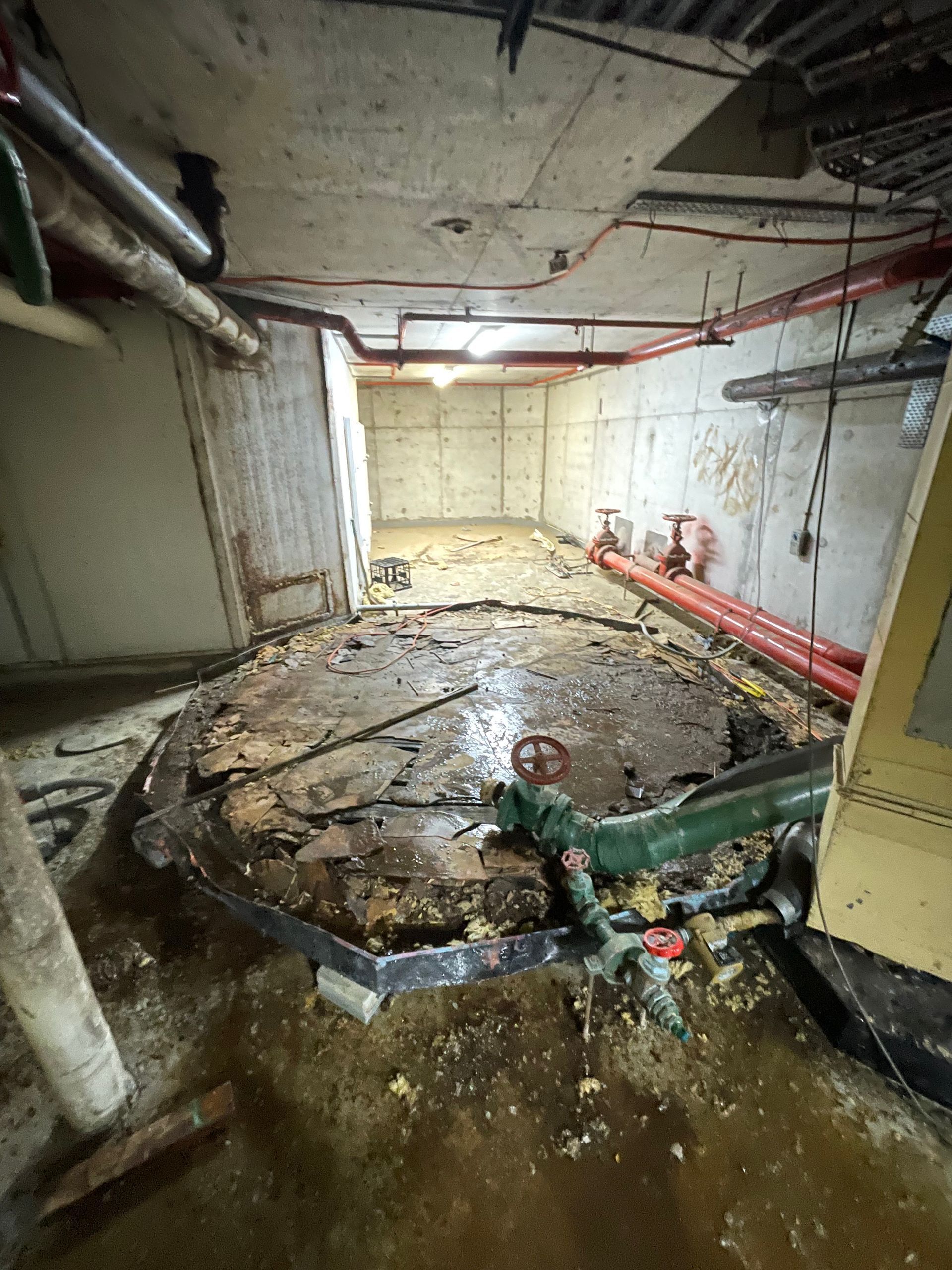 A Dirty Room with a Circular Object in the Middle of It — Demco in Currumbin Waters, QLD
