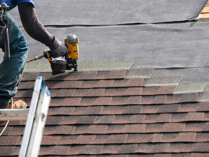 Bardstown, Kentucky, Ark roofer fixing hole saw tooth for roof replacement