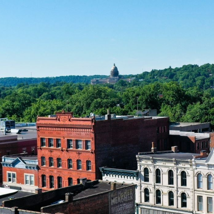 Soaring above Frankfort, KY, where Ark Covering & Restoration provides a bird's-eye view of quality roofing services.  From roof replacement to insurance claim assistance, we're your local experts.