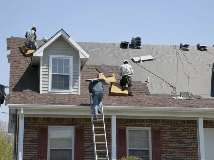 Ark roofer drilling roof wall for roof replacement from storm damage in Bardstown, Kentucky