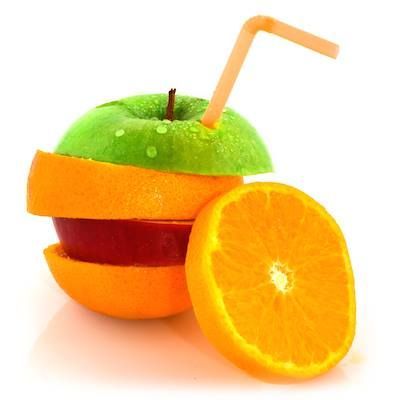 Sliced apple, orange, and apple stack with straw, single orange slice beside.