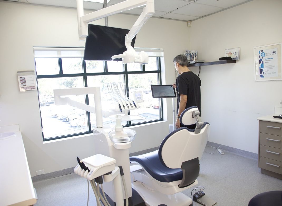 Dentist in the Clinic — Menai, NSW — Top Care Dental