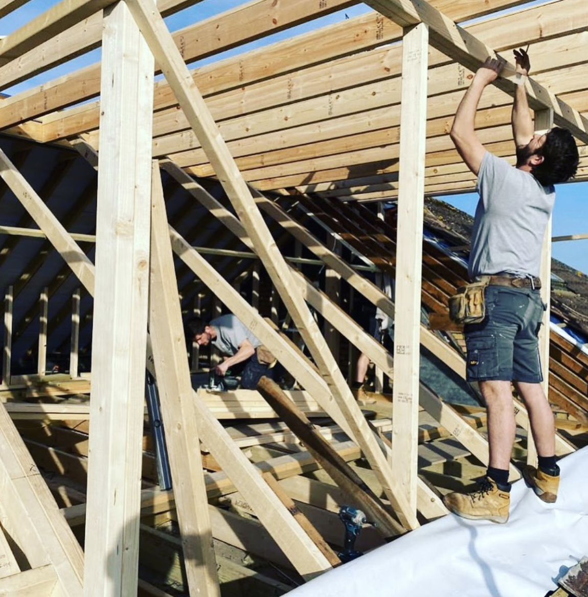 Lee from Park Lofts working on the timber structure of a new loft conversion in Bristol