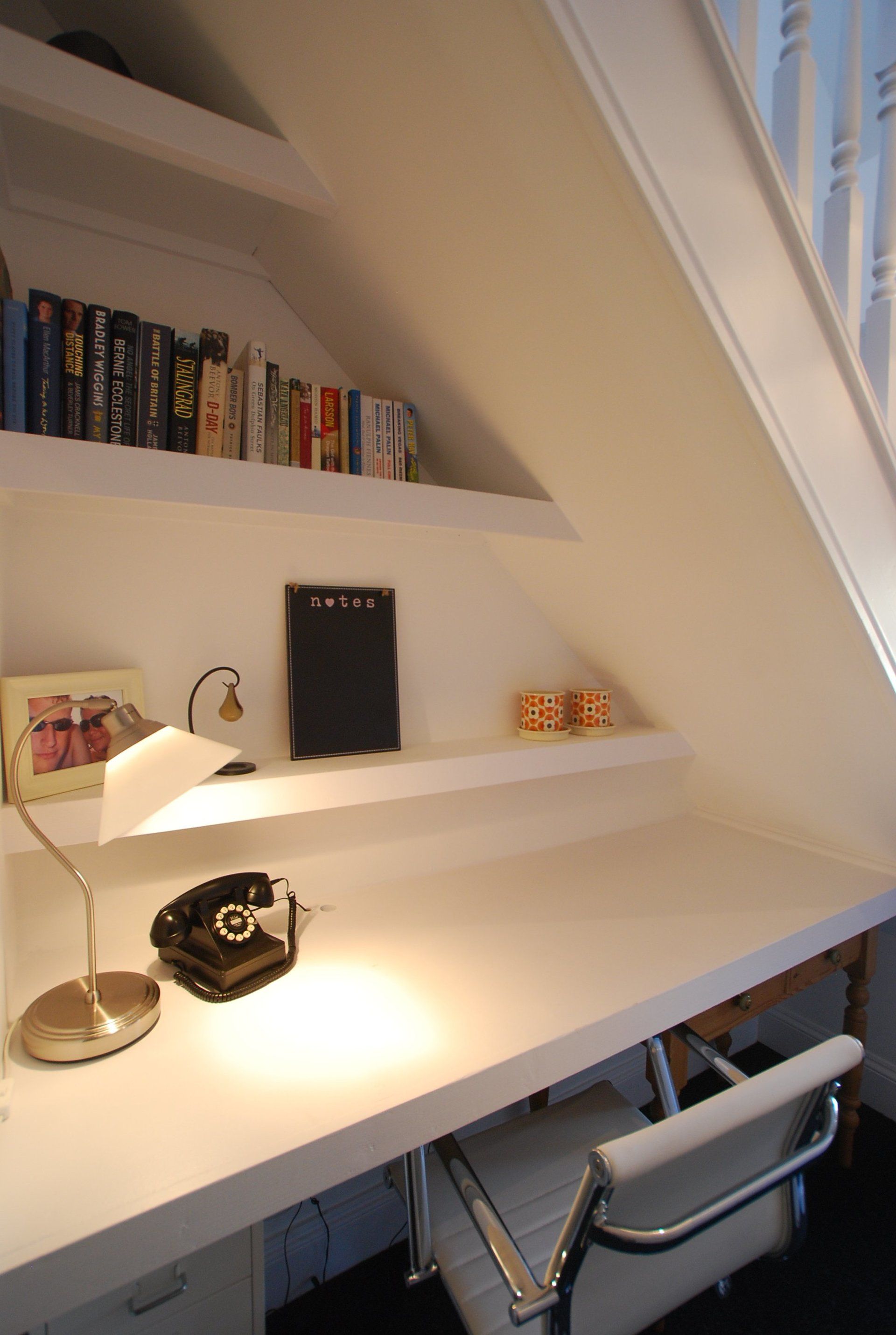 Space underneath stairs leading up to a loft