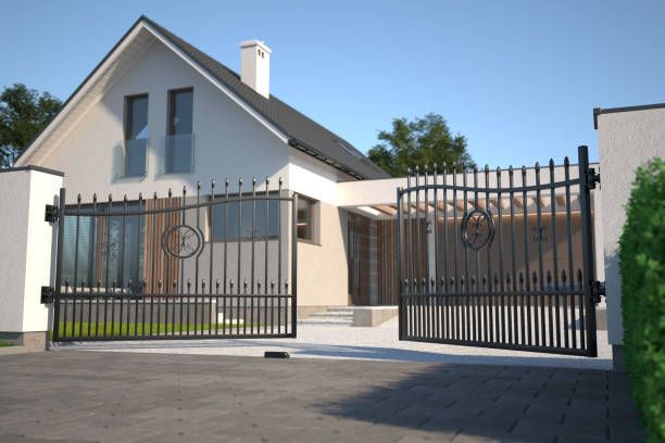 Residential property with newly installed custom iron gates.
