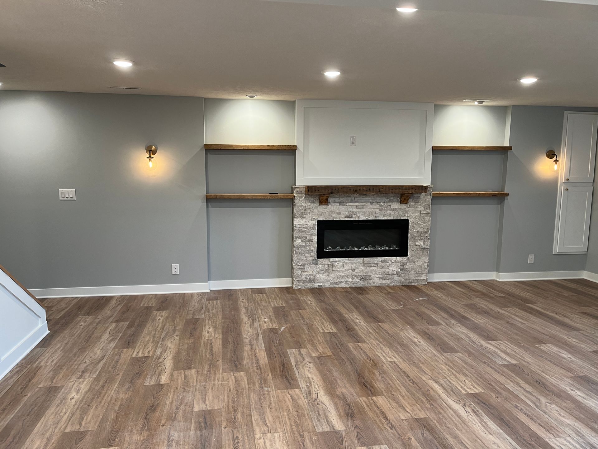 There is a fireplace in the middle of the room.