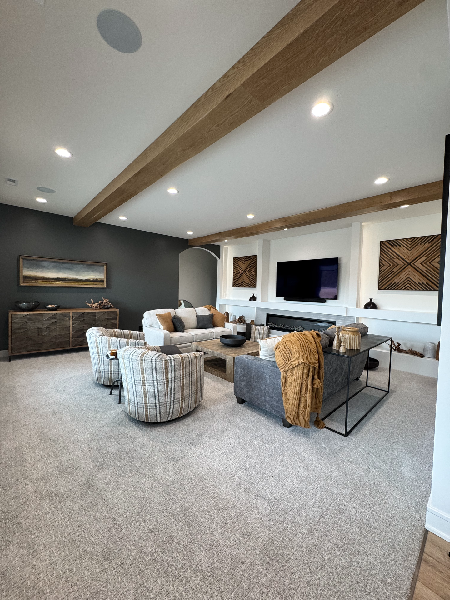 A living room filled with furniture and a flat screen tv.