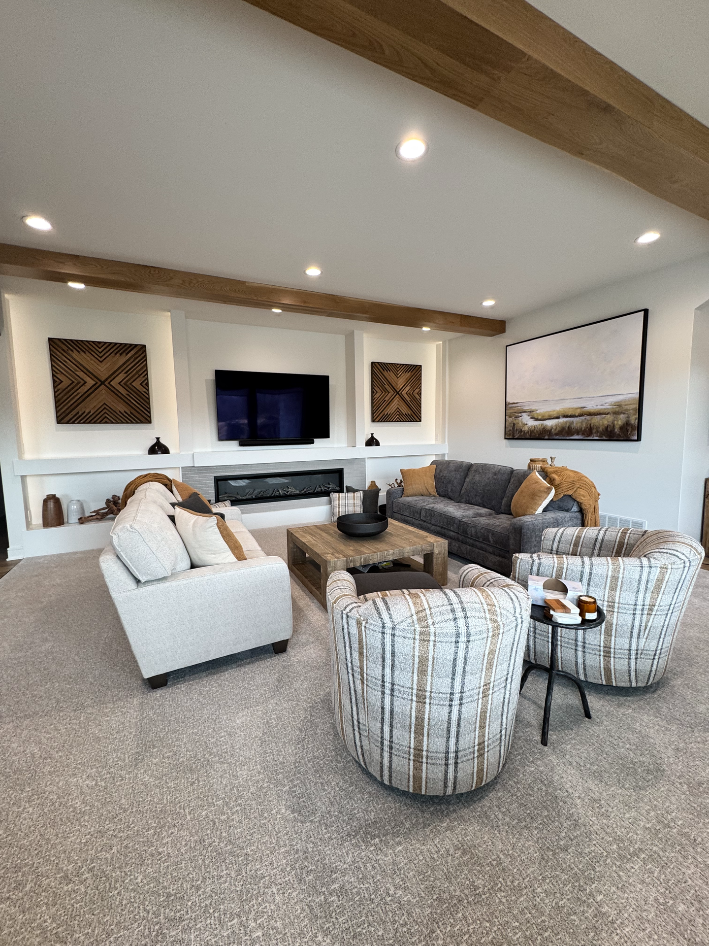 A living room filled with furniture and a flat screen tv.