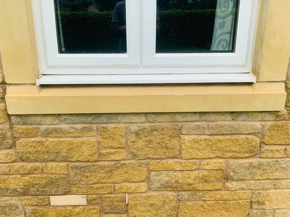 Outdoor window sill after cleaning