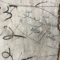 a close up of a piece of paper with writing on it .