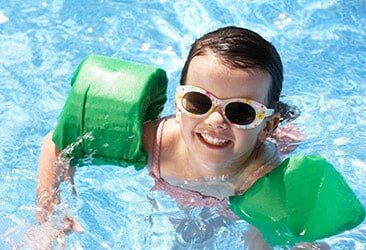 Little Girl with Floaters— Pool Service in Kansas City, MO