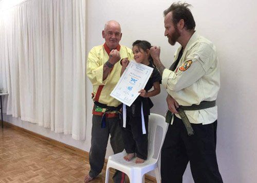 girl winning certificate