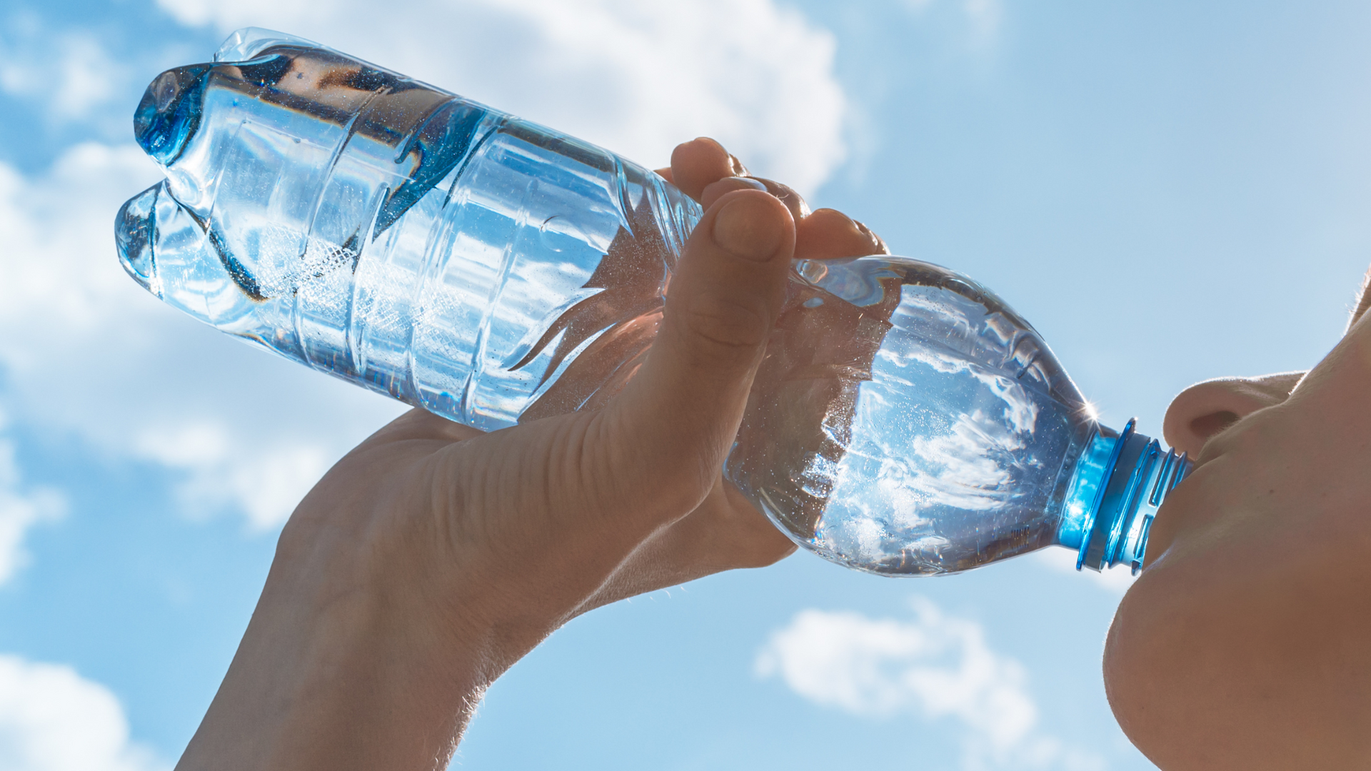 Drinking water, Central Valley drinking water, sunny day drinking filtered water from bottle