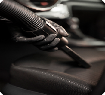 A person is using a vacuum cleaner used by That's Clean in Frederick MD