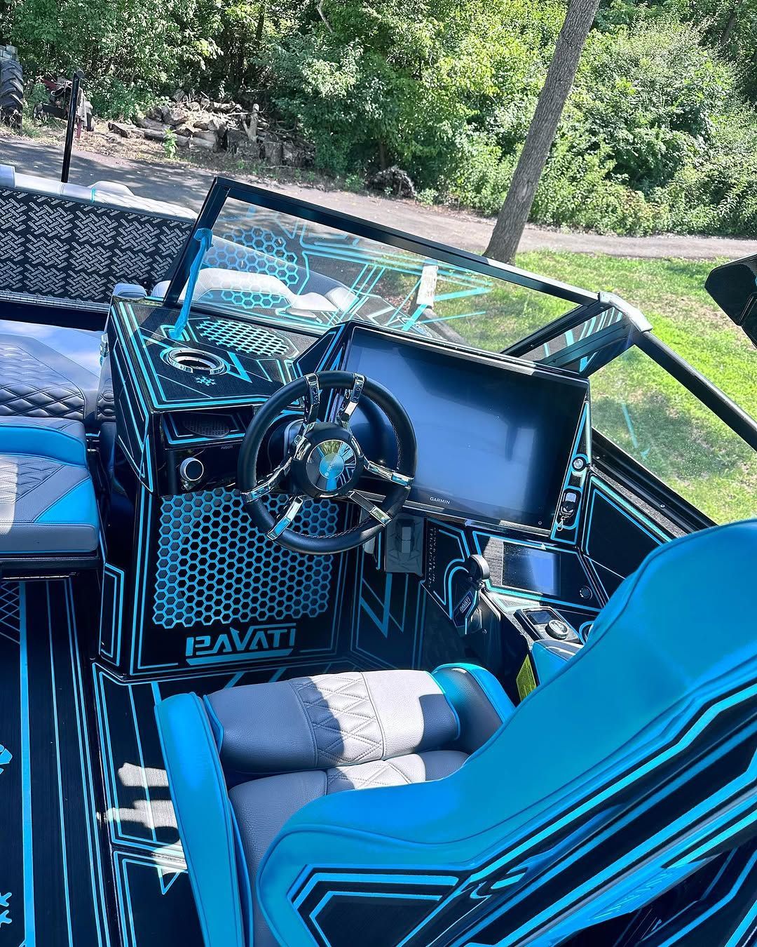 The inside of a blue and black boat detailed by That's Clean in Frederick MD