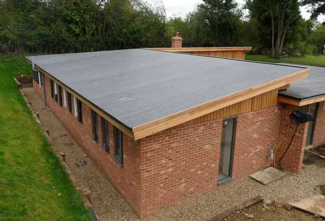 A gutter guard installed on a residential roof.