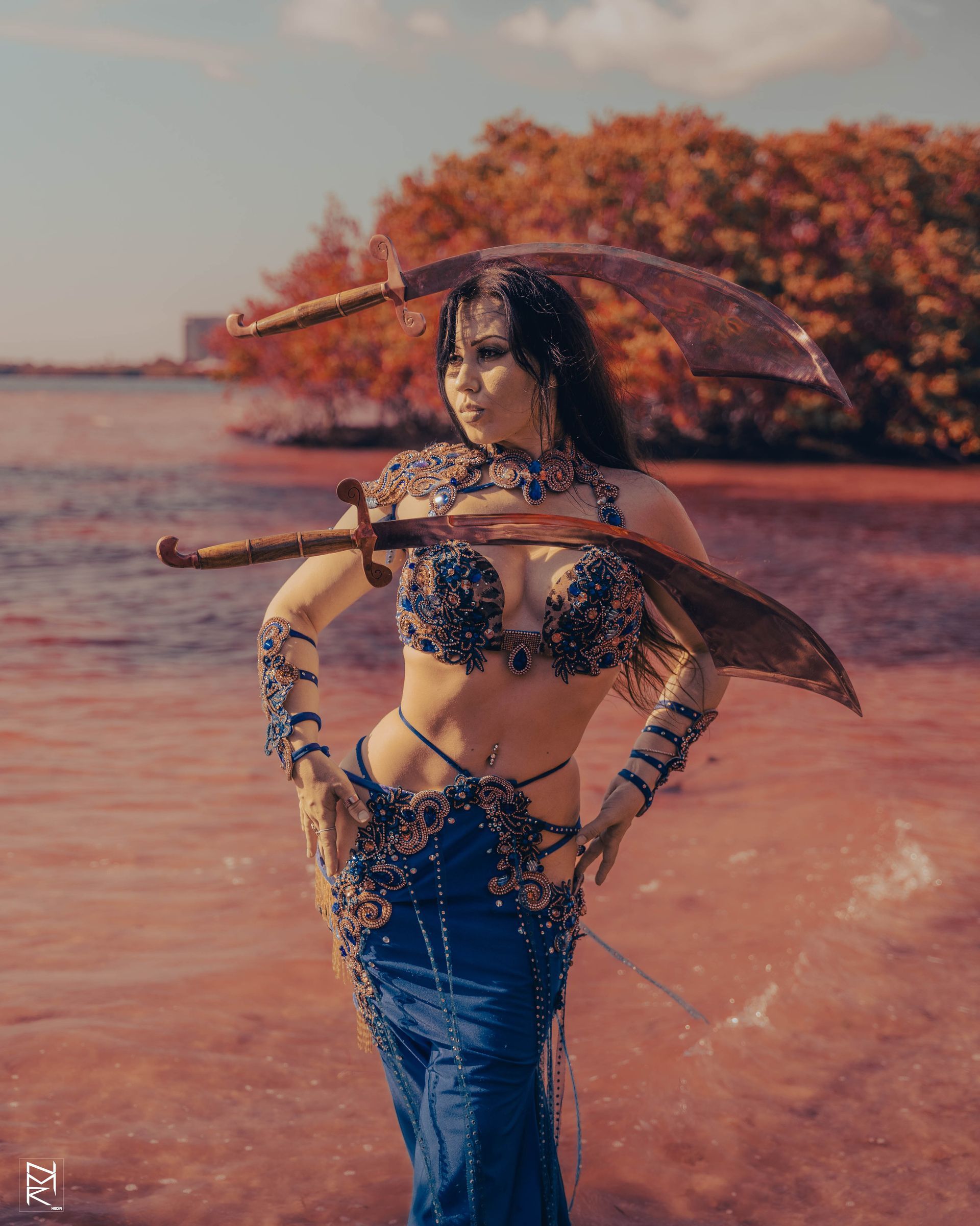 A photo of the Belly Dancer Azeeria Azizah in the water at cypress beach, Tampa Fl