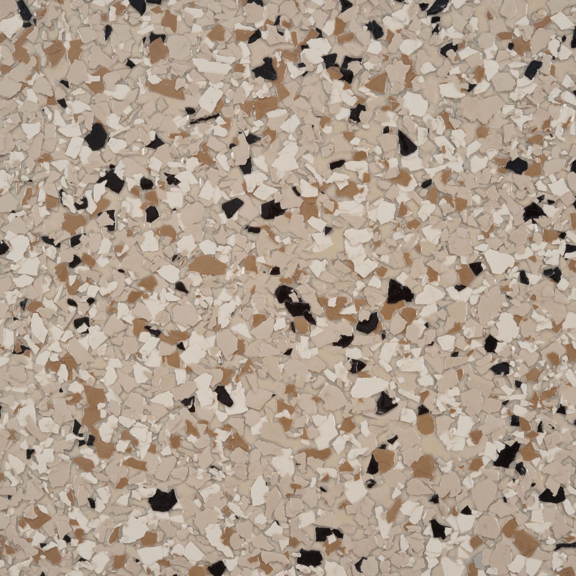 A close up of a marble floor with black and white spots