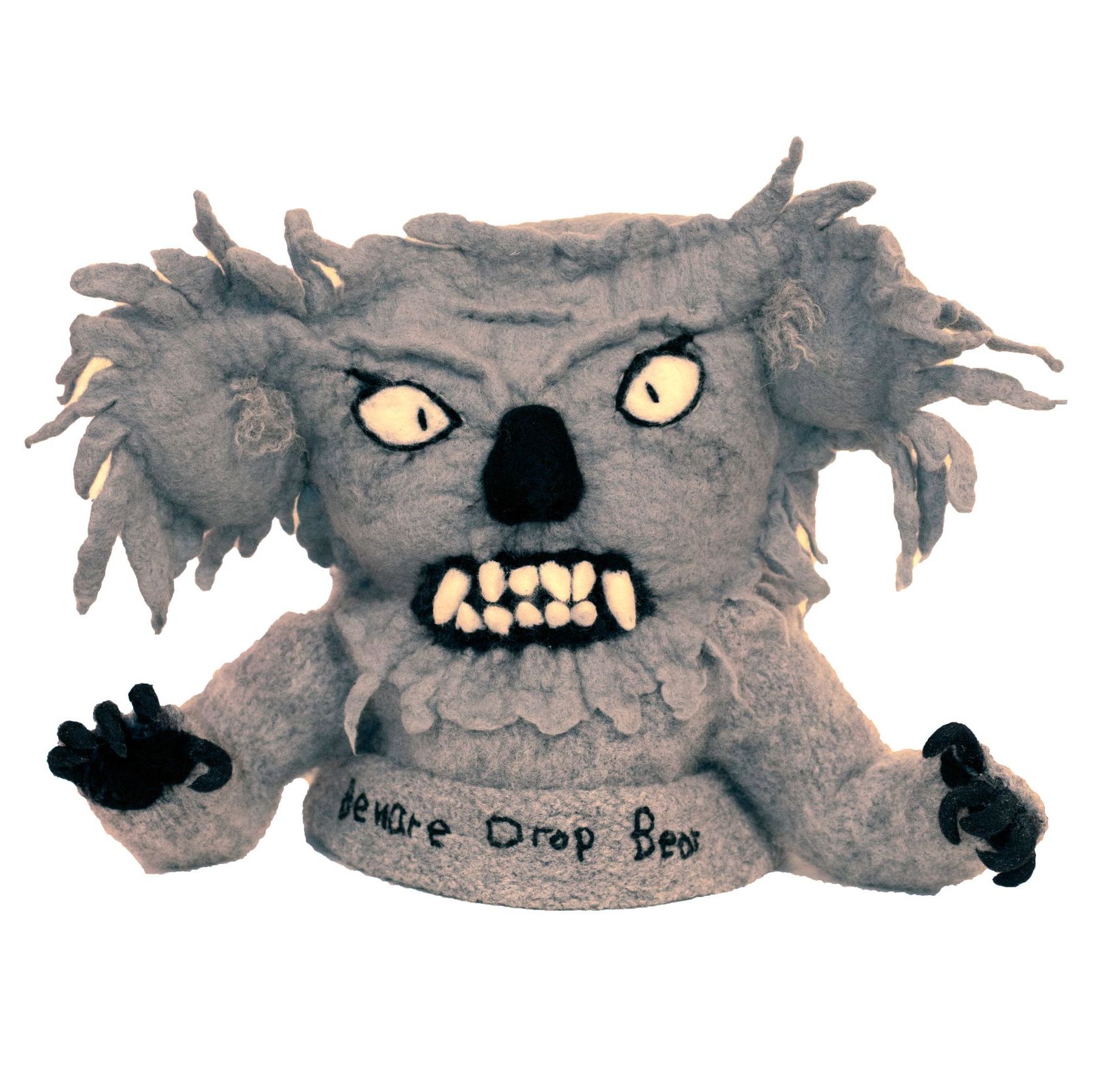 A stuffed koala bear with a beware drop box on its chest