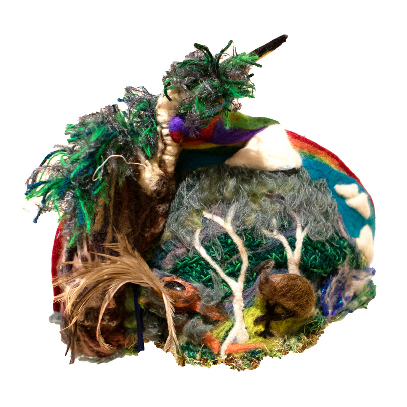 A globe with a rainbow and trees on it