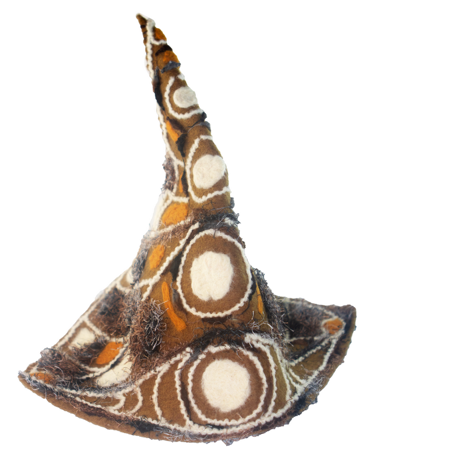 A brown and white witch hat with circles on it