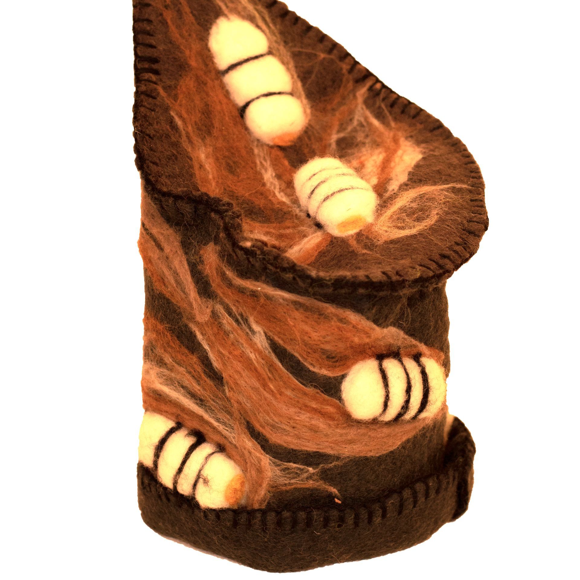 A close up of a brown item with bees on it