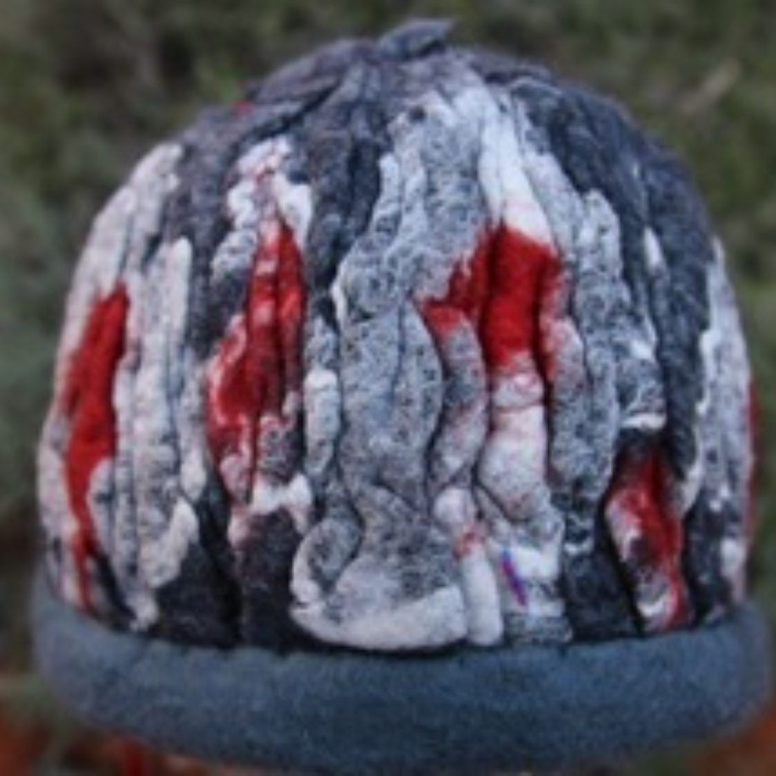 A hat with red white and blue stripes on it
