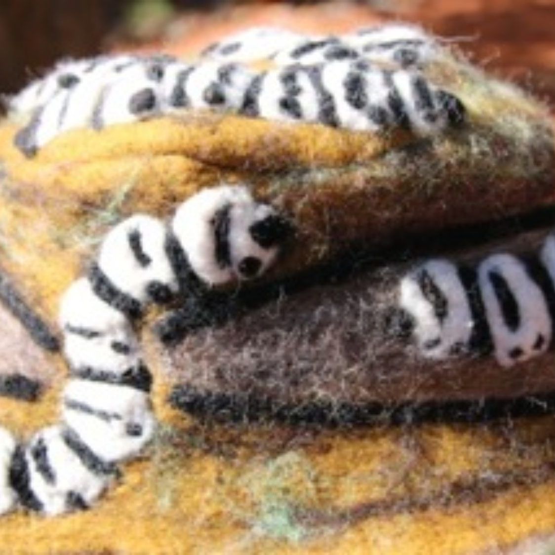 A close up of a stack of bracelets with numbers on them