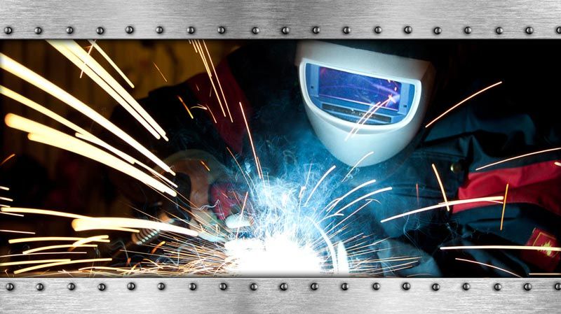 welder wearing mask