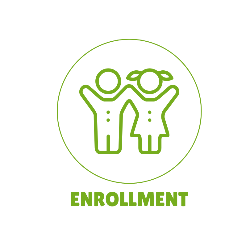 Two children are holding hands in a green circle.