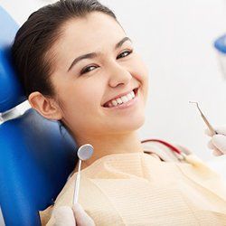 General Dentistry — Woman Smiling in Plainville, MA