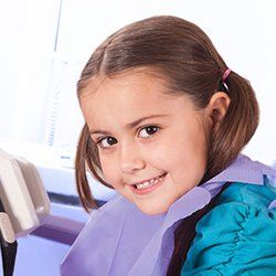Cosmetic Dentist — Child Smiling in Plainville, MA