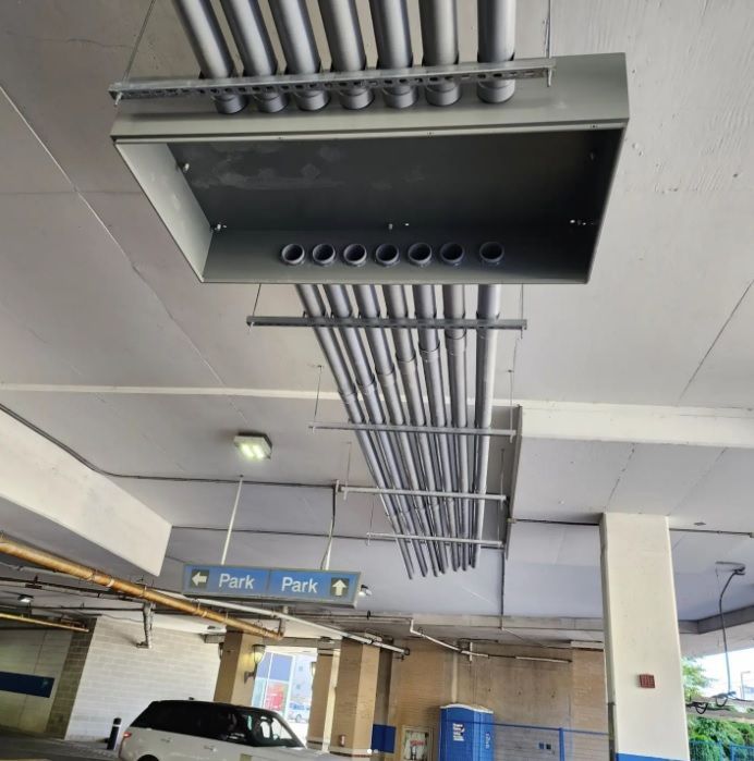 A parking garage with a sign that says park