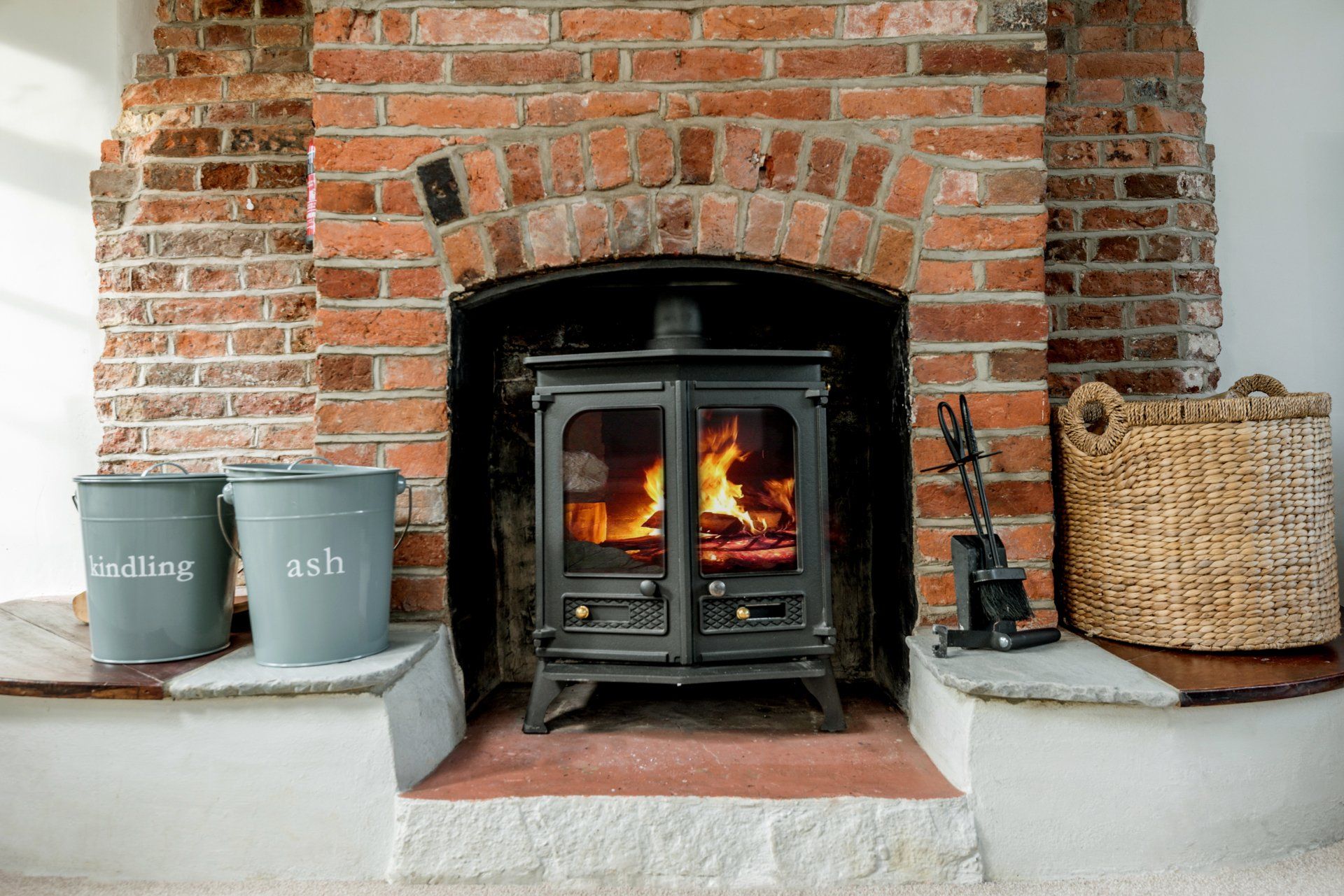 Comfort and warmth given by a lovely woodstove in this holiday cottage