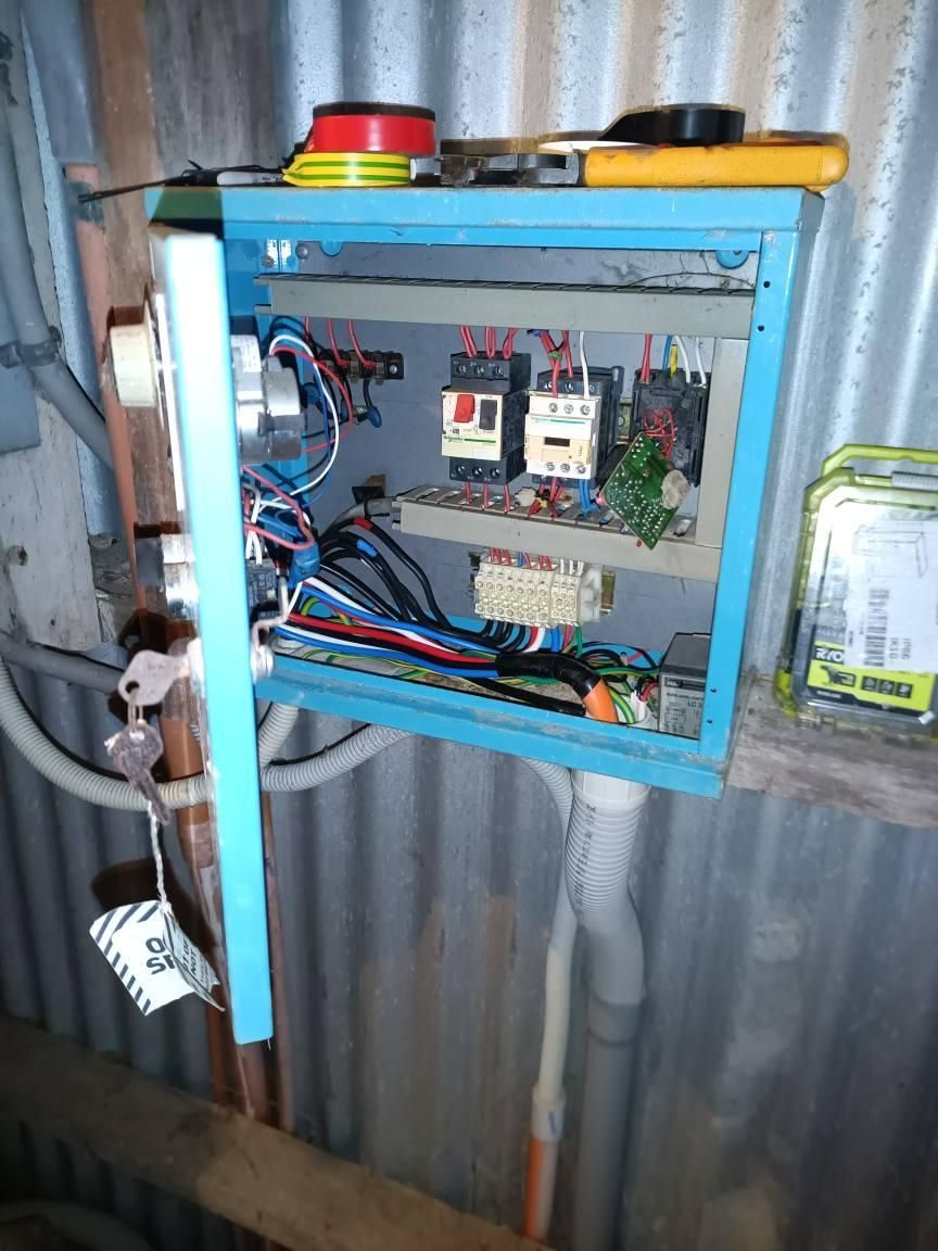 A Blue Box With a Bunch of Wires — Instant Spark Electrical in Glen Isla, QLD