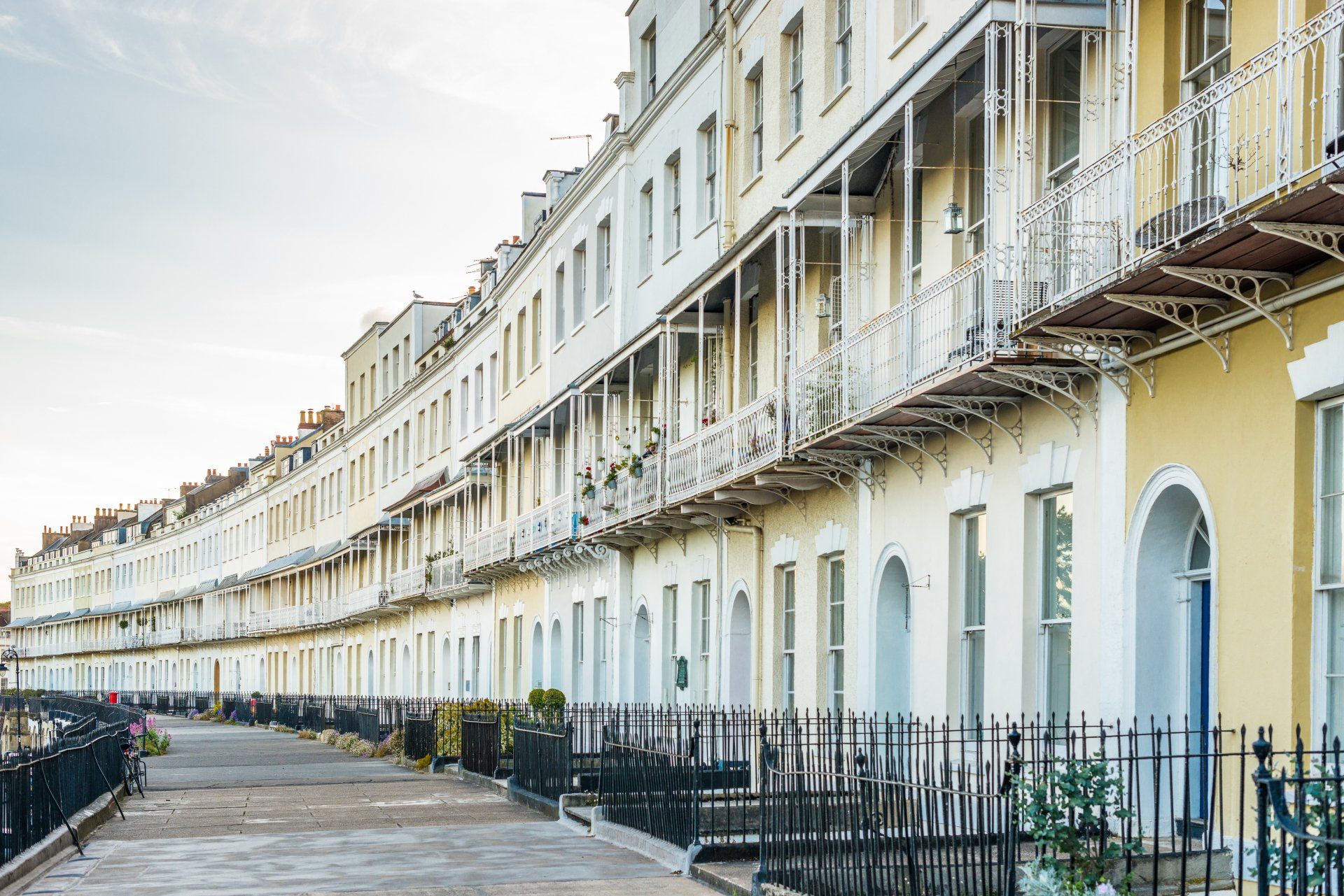 A row of houses with balconies in a residential area.