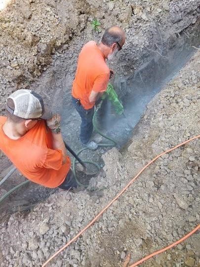 Workers Doing Deep Excavation