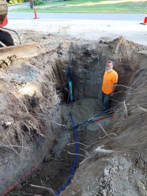 Worker Standing on the Newly Excavated Area