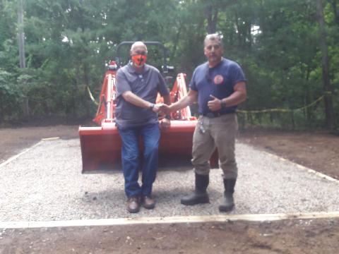 Owner Showing Thumbs Up and Satisfied Client