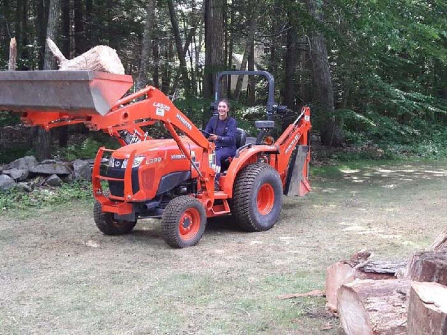 Woman Operating a Front Loader