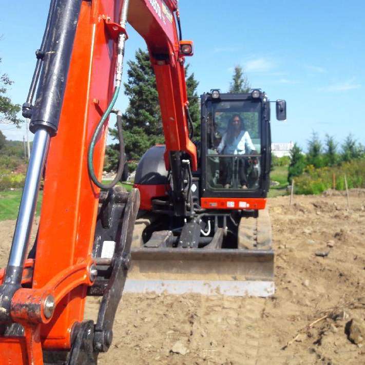 Professional Worker Operating a Excavator