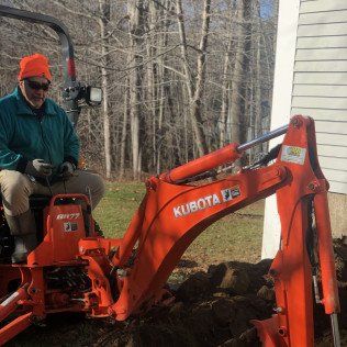Worker Doing Backyard Excavation
