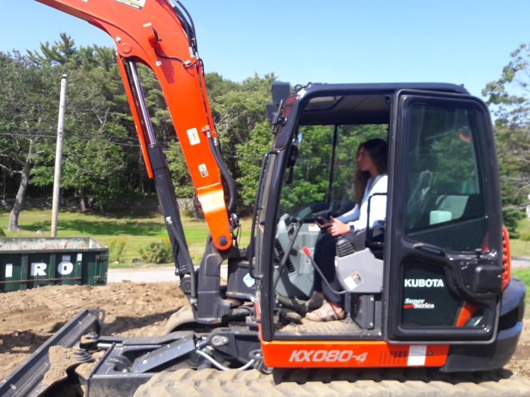 Woman on a Backhoe