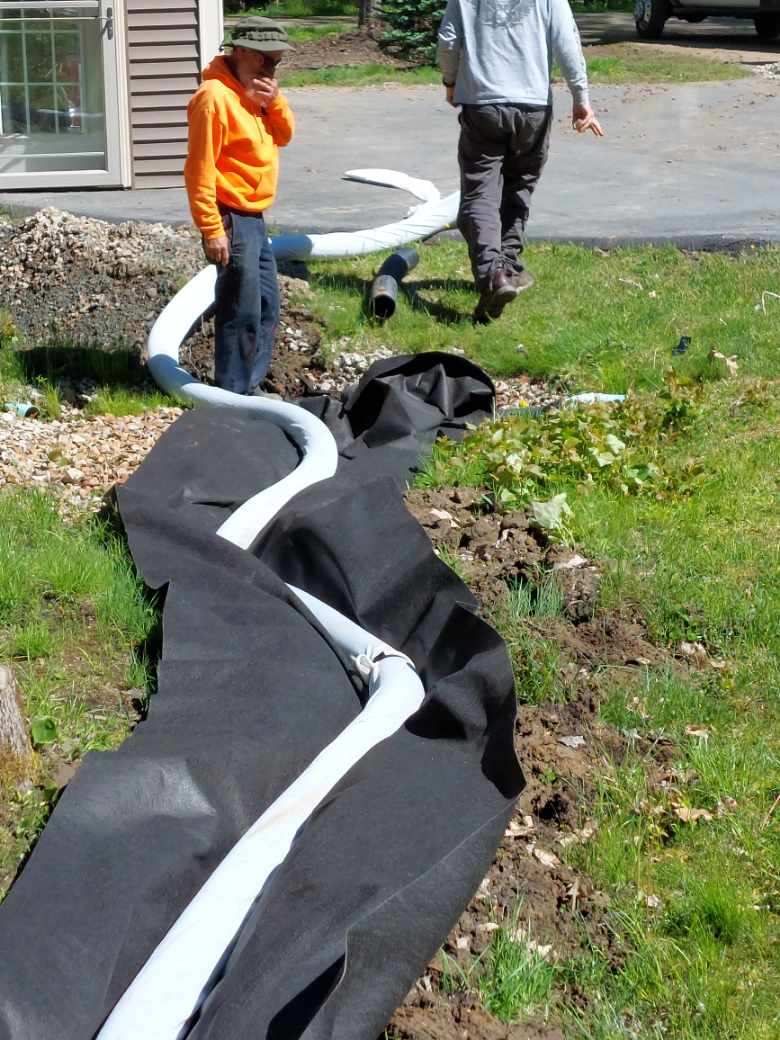 Workers Installing New French Drain