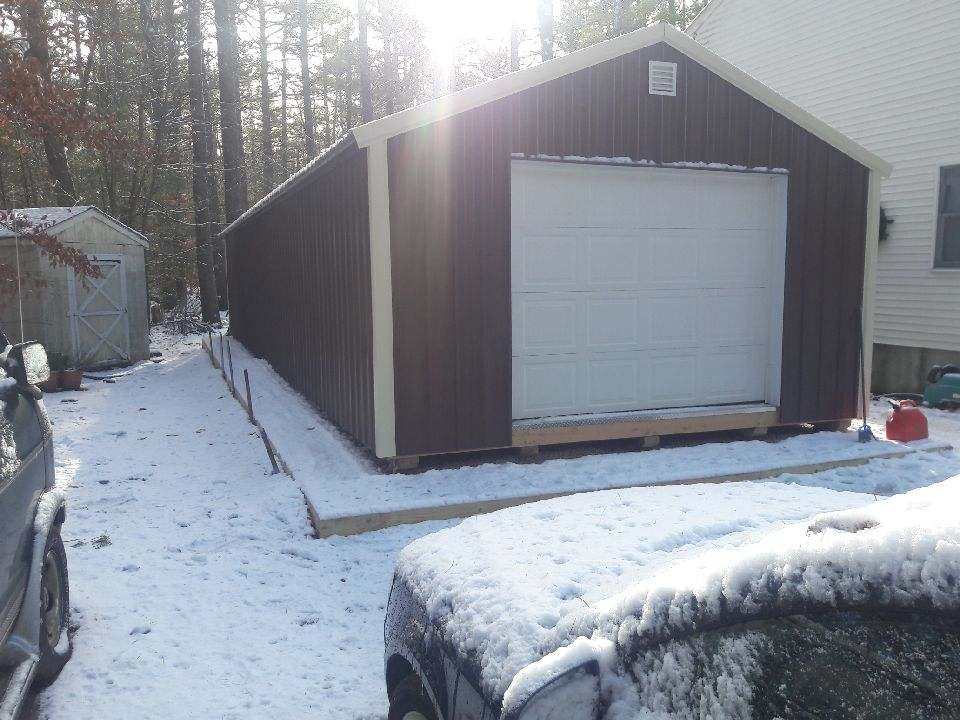 A Shed Covered in Snow