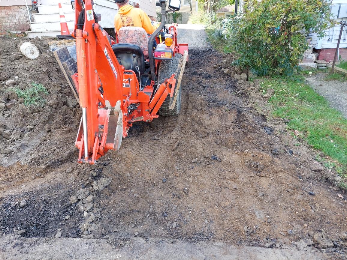 Worker Doing Land Grading