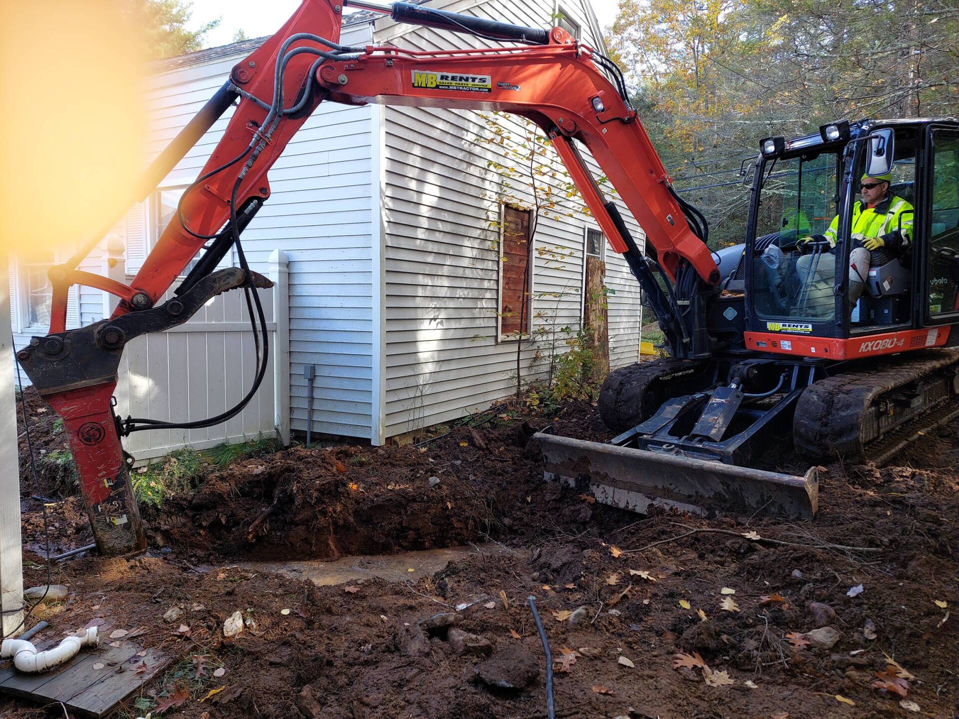Professional Worker Excavating New Water Line