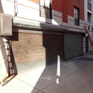 Waterloo Place Apartments Before — Garage Doors in Baltimore, MD