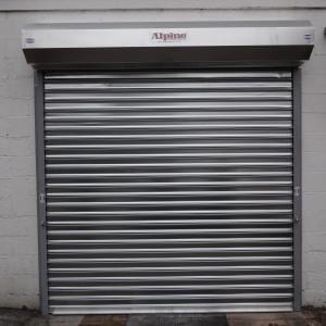 Glen Burnie Lawn Mower Garage Door Before — Garage Doors in Baltimore, MD